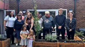 Volunteers celebrating the Hive garden