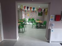 A welcoming community café space at The Hive